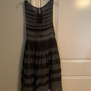 Gorgeous black dress with cream stripe
